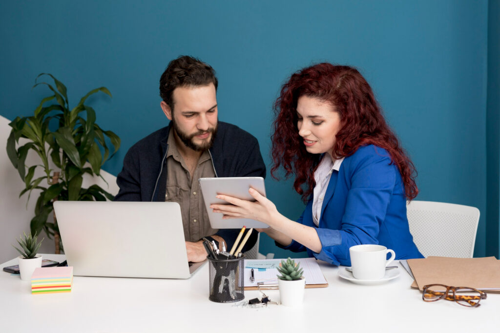 Corporate professionals discussing recruitment and placement consultancy servicesplacement consultancy vs LinkedIn comparison